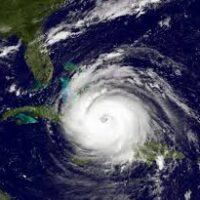 a photograph of a large hurricane heading to the state of florida in the Atlantic Ocean